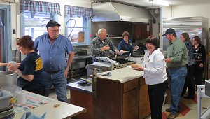 In the Legion kitchen preparing the luncheon for the volunteers.