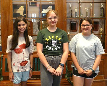 2022 Middle School poster winners Emily Williams, Abby Polaro, and Sadie Laing.